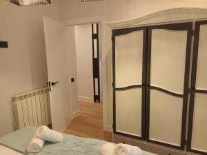 A bed or beds in a room at Apartamento Roma 8