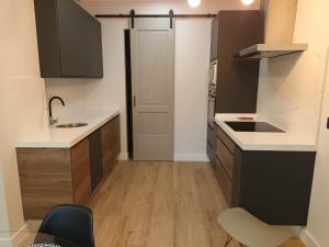 A kitchen or kitchenette at Apartamento Roma 8