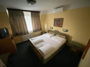 Posteľ alebo postele v izbe v ubytovaní Haus Liberty