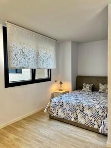 Postel nebo postele na pokoji v ubytování Studio CP Poblenou