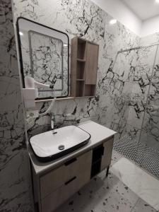 Koupelna v ubytování Te Aldo Hotel