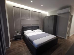 Postel nebo postele na pokoji v ubytování Te Aldo Hotel