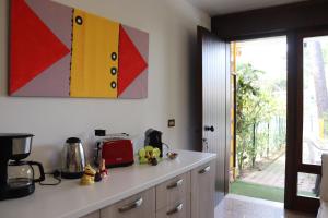 A kitchen or kitchenette at Beach House Riviera