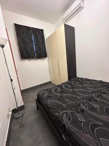 Un pat sau paturi într-o cameră la Casa Jancura Canneto
