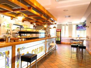 Lounge nebo bar v ubytování Hotel La Colina