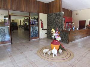 The lobby or reception area at Equator Hotel