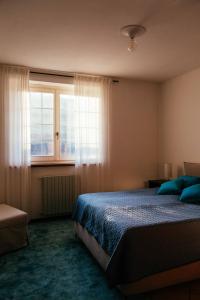 a bedroom with a bed and a large window at Casa villetta "La Colomba" Nizza Monferrato in Nizza Monferrato +83 photos