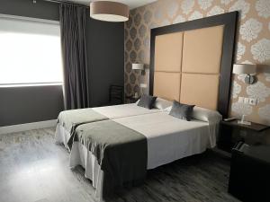 Posteľ alebo postele v izbe v ubytovaní A Finca Hotel