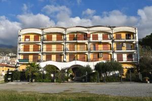a large building with balconies on the side of it at B&B Alba Chiara in Paola