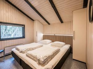Postel nebo postele na pokoji v ubytování Holiday home Nørre Nebel LXXIV