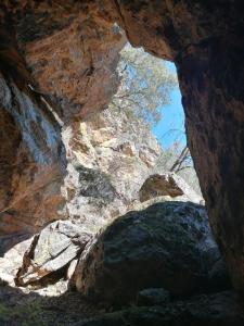 a view from inside a rock cave at La Balconera de Ana in Puebla de Don Rodrigo