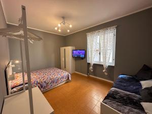 TV a/nebo společenská místnost v ubytování Casa Natalina