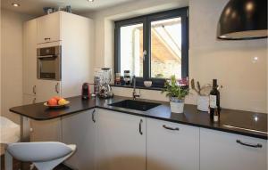 A kitchen or kitchenette at Nice Home In Eyzahut With House A Panoramic View