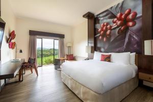 Ein Bett oder Betten in einem Zimmer der Unterkunft Costa Rica Marriott Hotel Hacienda Belen