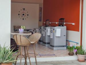 a coffee shop with at Jomtien Beach Condominium S1 by Olga in Jomtien Beach