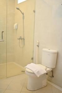 Koupelna v ubytování KAWANA HOTEL