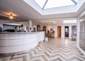 a lobby with a reception counter at Crofthead in Ayr
