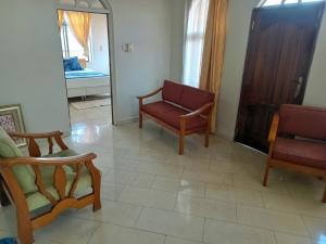 PRESTIGE Guesthouse ,Ksi的休息区