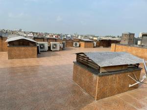 a rooftop with a view of a city at Hotel Rivasa Regency in New Delhi