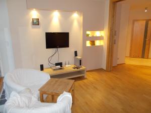 TV a/nebo společenská místnost v ubytování Apartament w Ustroniu