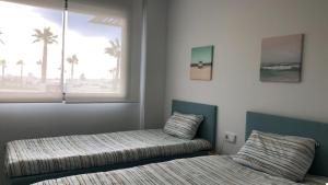 Posteľ alebo postele v izbe v ubytovaní Casa Relax Seascape - Finestrat