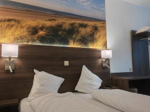 Postel nebo postele na pokoji v ubytování Hotel Albert II Oostende