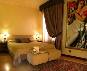 Una cama o camas en una habitación de Hotel Liassidi Palace
