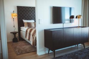 Cama o camas de una habitación en Apukka Rovaniemi City Apartments