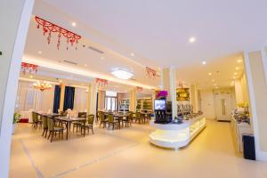 Posezení v ubytování Continental Xin Hao Hotel and Resort 洲际新濠酒店