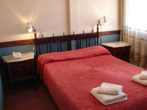 Кровать или кровати в номере Gran Hotel España