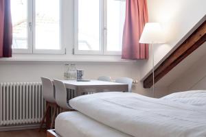 Linde Heiden Swiss Quality Hotel客房内的一张或多张床位