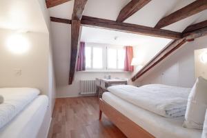 Linde Heiden Swiss Quality Hotel客房内的一张或多张床位