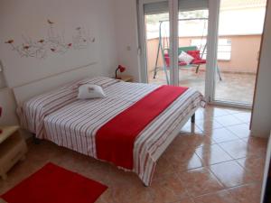 Posteľ alebo postele v izbe v ubytovaní Apartments Luvi