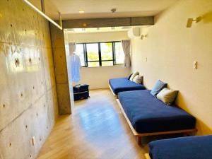 Posezení v ubytování CONDOMINIUM 紅-BIN-
