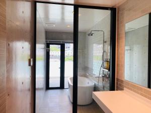 Koupelna v ubytování CONDOMINIUM 紅-BIN-