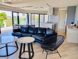 Posezení v ubytování CONDOMINIUM 紅-BIN-