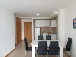 Η κουζίνα ή μικρή κουζίνα στο Apartamentos Sanxenxo 3000