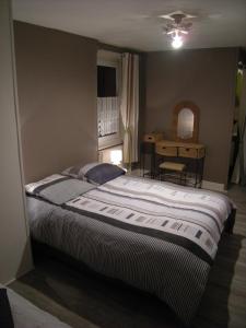 Posteľ alebo postele v izbe v ubytovaní Hotel gites des touristes