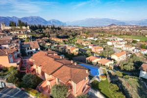 an aerial view of a town with houses at Loft Diamante in Soiano del Lago