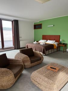 Ένα ή περισσότερα κρεβάτια σε δωμάτιο στο Hotel Beroun Golf Club