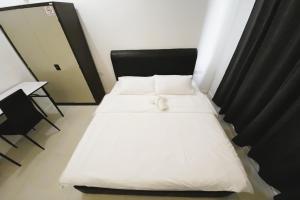 Postel nebo postele na pokoji v ubytování Island Hostel Bayan Lepas Airport