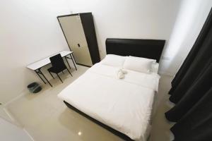 Postel nebo postele na pokoji v ubytování Island Hostel Bayan Lepas Airport