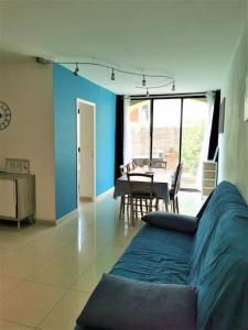 Posedenie v ubytovaní Appartement La Tranquillité, 2mn à pieds mer + 4 fotografie