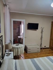TV a/nebo společenská místnost v ubytování B&B RUFHOUSE