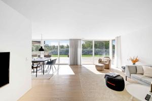 a living room with a couch and a table at Heavenport in Vester Sømarken