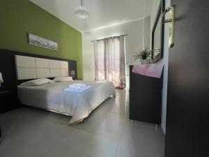 Кровать или кровати в номере Villa Antonis deluxe apartments