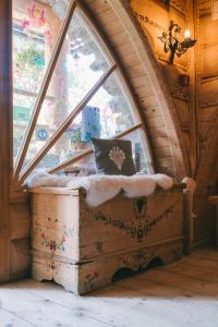 a window with a pillow on a chest in a room at Pokoje Javorina in Zakopane