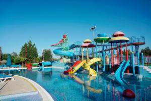 a pool with a water park with a water slide at Alfagar Alto da Colina in Albufeira