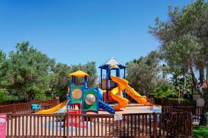 a playground with a colorful play equipment in a park at Alfagar Alto da Colina in Albufeira