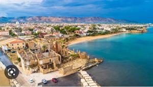 an aerial view of a town with a beach at A Za' Nella Avola in Avola